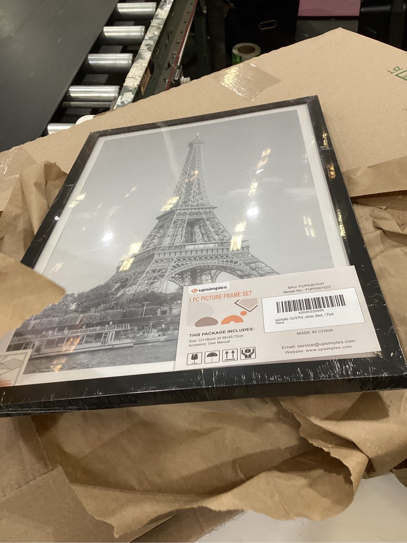 Condition photo showing Good Condition for upsimples 12x18 picture frame, display pictures 11x17 with mat or 12 x 18 without, wall hanging poster frames, black, 1 pack black 12x18