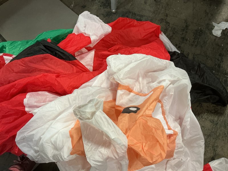 Condition photo showing As Is for 12 Ft by 5.9 Ft Giant Christmas Inflatables Nutcracker Soldier Build in LED Lights, Outdoor Xmas Decoration, Blow Up Nutcracker for Square Lawn Garden Patio Holiday Party Decor