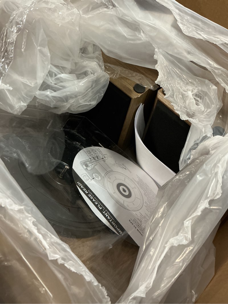 Condition photo showing As Is for Victrola Montauk Vinyl Record Player, 3-Speed Belt Driven Turntable with Stereo Bluetooth Speaker Pair, RCA Output and 3.5mm Headphone Jack, Removable Dust Cover, Farmhouse Walnut Finish Farmhouse Walnut System