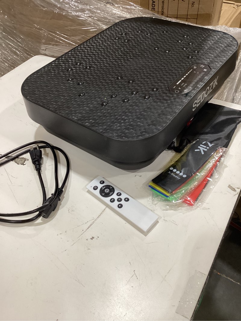 Condition photo showing As Is for sedozik vibration plate exercise machine