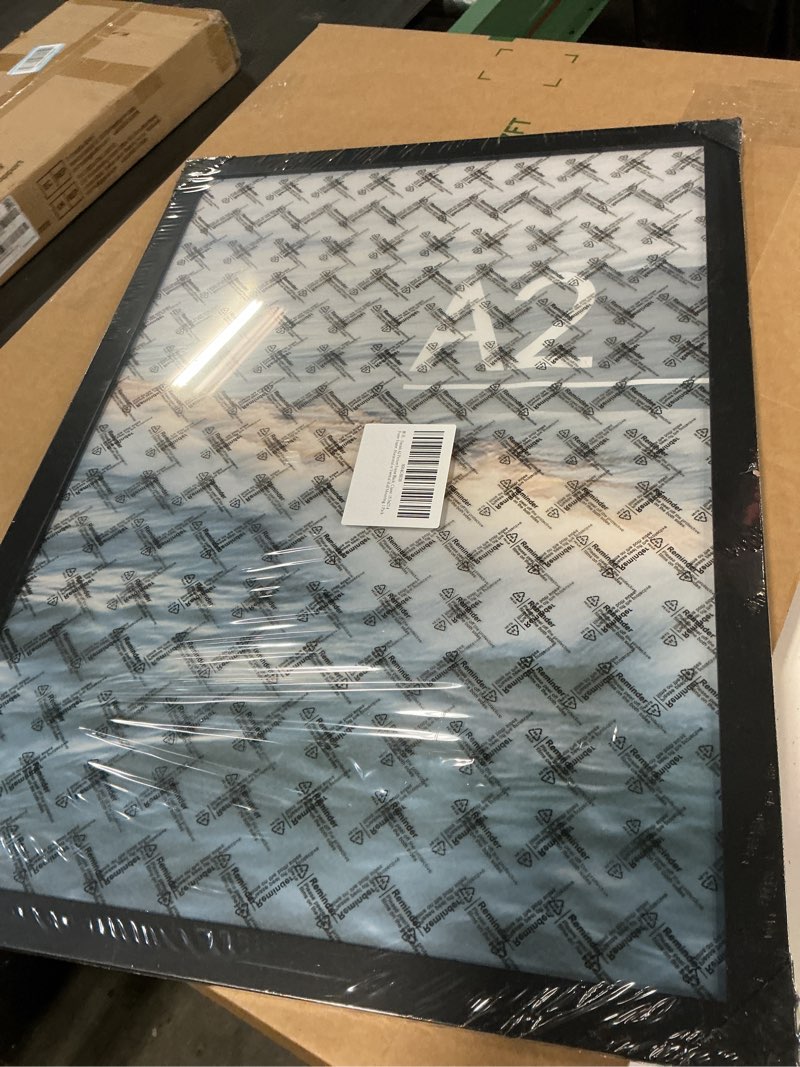 Condition photo showing Good Condition for a2 picture frame black, classic 16.5x23.4 poster frame, horizontal or vertical wall mounting, 1 pack black a2
