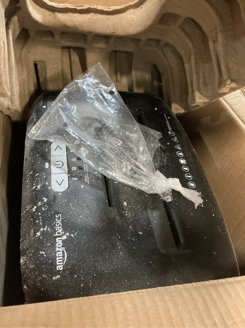 Condition photo showing As Is for Amazon Basics Paper Shredder for Home and Office, New Model 15-Sheet Cross Cut, CD/Credit Card Shredder, 6 Gallon Wastebasket, Black