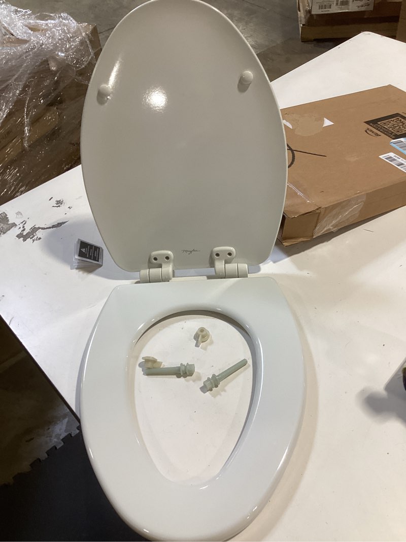 Condition photo showing Good Condition for mayfair linden slow close toilet seat, non slip heavy duty wood, easy install, elongated, white elongated traditional hinge