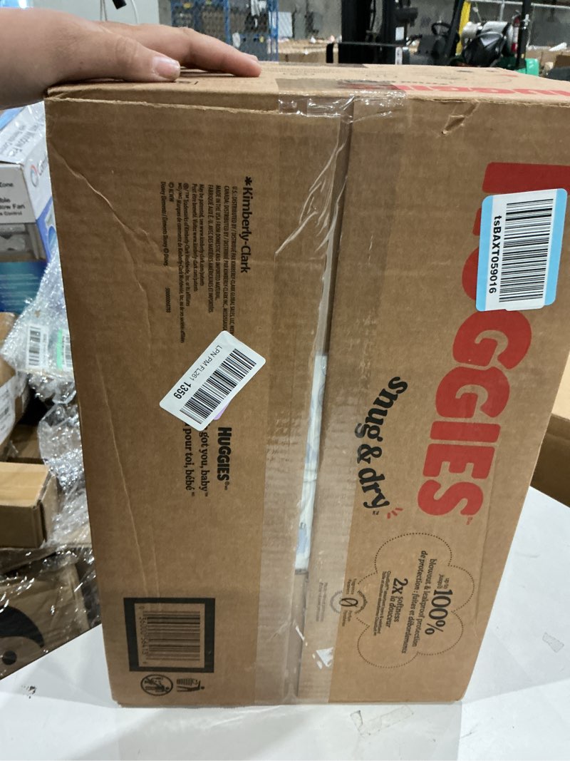 Condition photo showing New/Like New for huggies snug & dry diapers - size 5 - 168ct