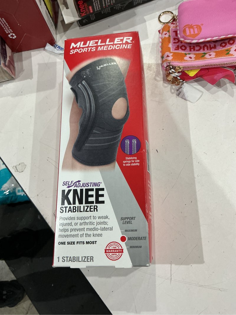 Condition photo showing Good Condition for mueller self adjusting knee stabilizer, black, one size fits most