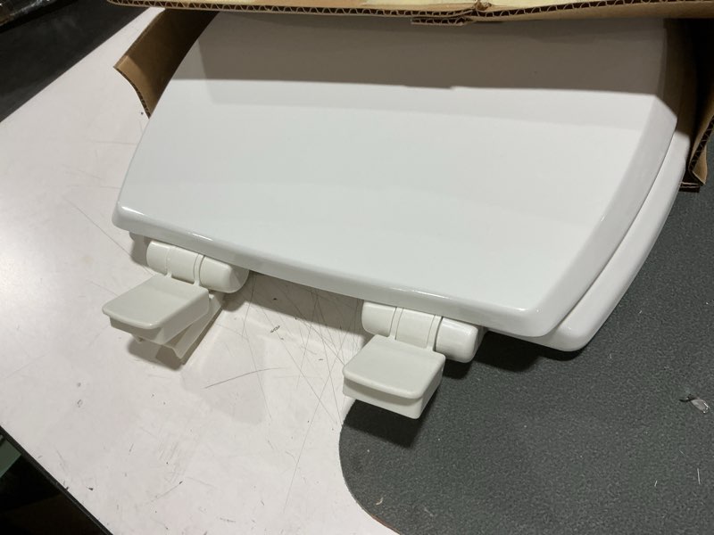 Condition photo showing As Is for mayfair cassel slow close toilet seat, easy clean, non slip premium wood seat, easy install, made in usa, elongated, white elongated 1 - toilet seat