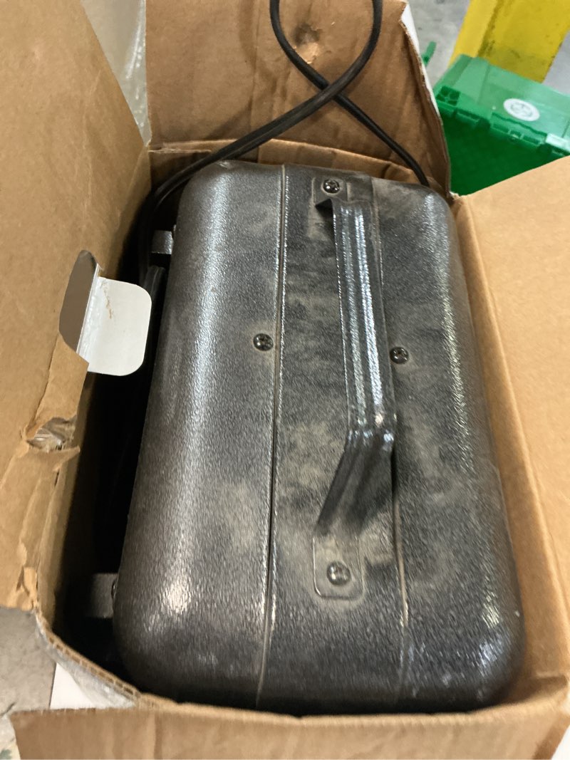 Condition photo showing As Is for utilitech ceramic space heater up to 1500w, 200 sq. ft