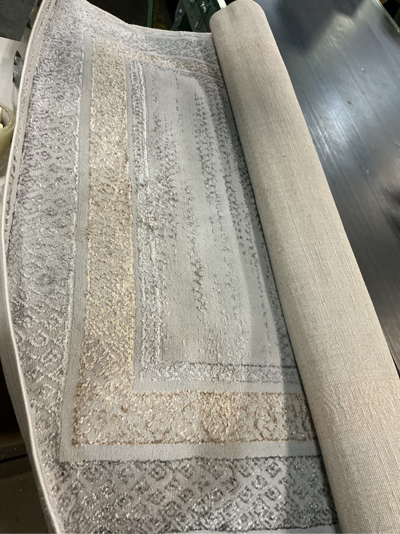 Condition photo showing As Is for (Similar)JONATHAN Y Marble Pattern High-Low Silver/Gold Indoor Area Rug, 8x10, Athens Classic Border, Easy-Cleaning for Living Room, Bedroom, Kitchen, Pet Friendly, Non-Shedding (CAR102C-8) Silver/Gold 7'9\" x 10' (Rectangular)