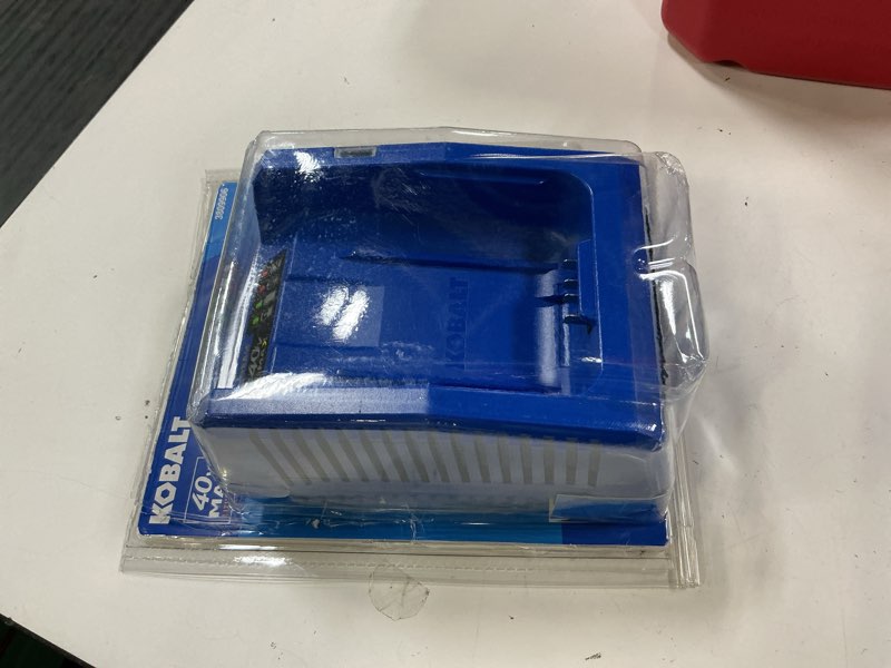 Condition photo showing As Is for kobalt 40-volt battery charger