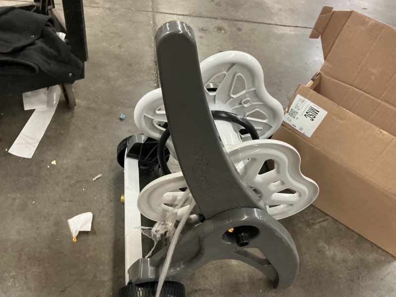 Condition photo showing As Is for suncast hosemobile plastic 175-ft cart hose reel