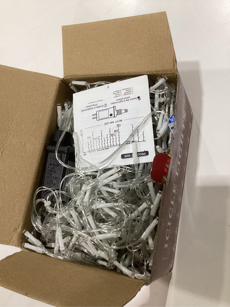 Condition photo showing As Is for icicle christmas lights outdoor, 66ft 640 led icicle lights for outside, plug in twinkle lights indoor with 8 modes timer waterproof for house holiday decor wedding christmas decorations (warm white) warm white 66ft 640 led, not tested