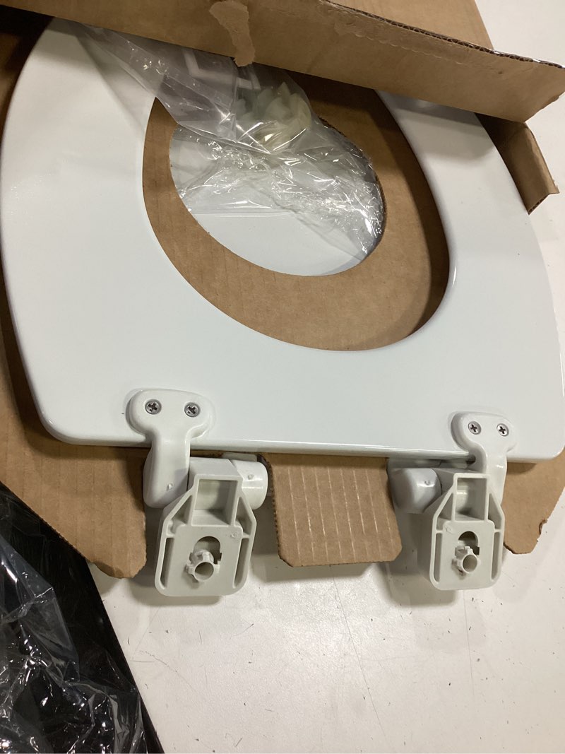 Condition photo showing Good Condition for mayfair linden slow close toilet seat, non slip heavy duty wood, easy install, elongated, white elongated traditional hinge
