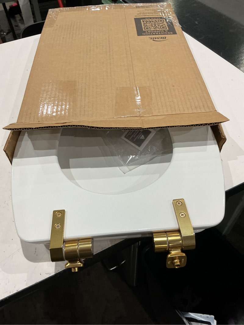 Condition photo showing Good Condition for mayfair bennett toilet seat with brushed gold hinges, slow close wood seat, secure metal hinges, easy install, made in usa, elongated, white elongated gold