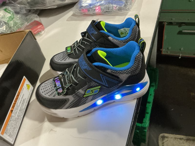 Condition photo showing Good Condition for skechers unisex-child tri-namics 10 toddler black/yellow/blue