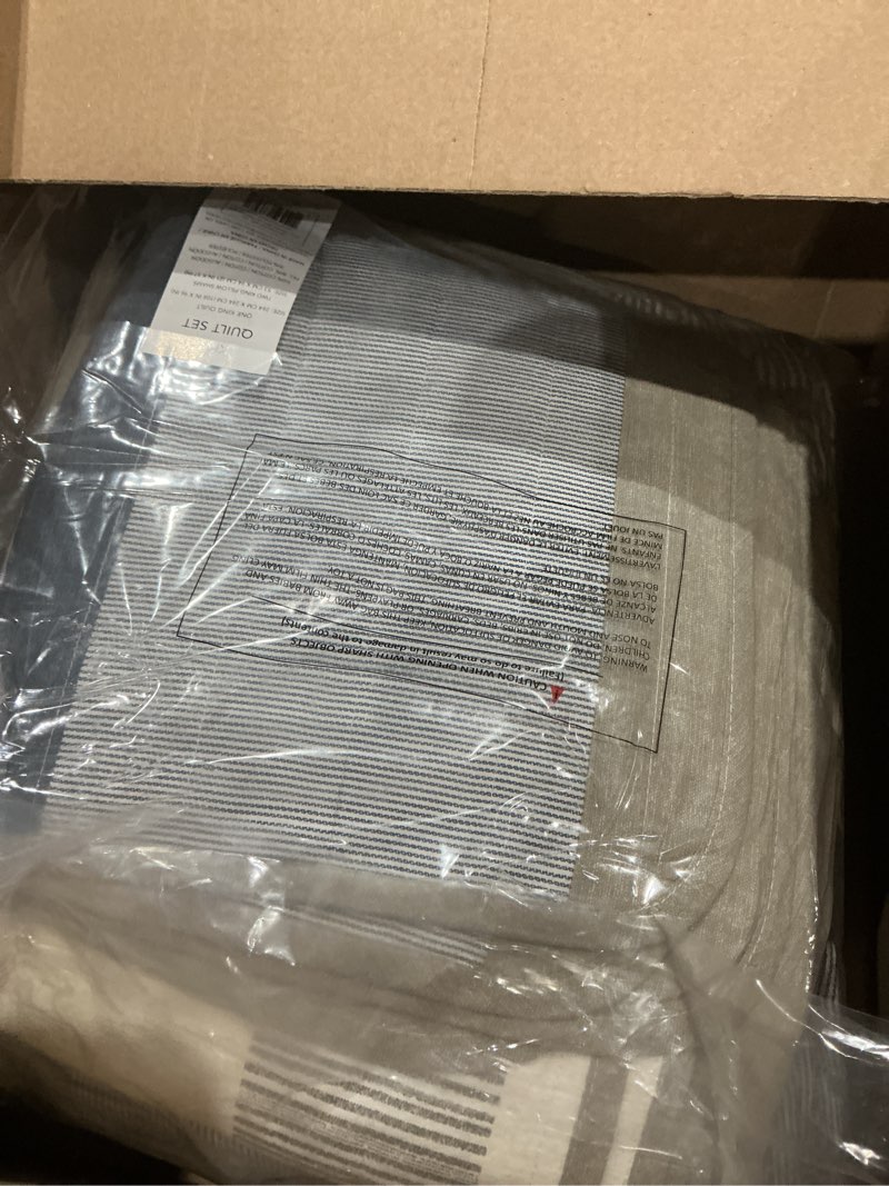 Condition photo showing As Is for (used)nautica - king quilt set, soft cotton bedding with a medium weight feel, reversible 3 piece bed set with matching pillowcases (galewood blue/beige)