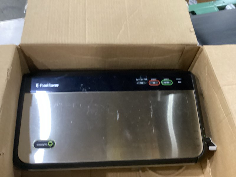 Condition photo showing As Is for not tested ***foodsaver vacuum sealer machine, automatic bag detection, sous vide friendly, with sealer bags, roll, handheld vacuum sealer, black vacuum sealer + accessories