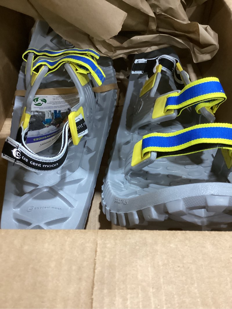Condition photo showing Good Condition for Crescent Moon Eco Eva Unisex Adult Ultralight Biodegradable EVA Foam Snowshoe Bundle for Men, Women and Youth with Rocker Cloud Deck, Ice Spikes & Trekking Poles and Bag Pair of Snowshoes