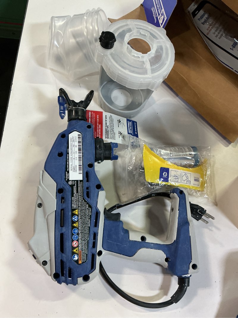 Condition photo showing As Is for (don’t work)graco truecoat 360 2000 psi plastic handheld paint sprayer