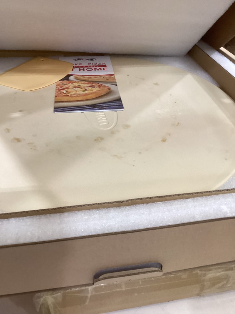Condition photo showing As Is for unicook 16 inch round pizza stone, heavy duty cordierite bread baking stone for oven and grill, thermal shock resistant, ideal for baking crisp crust pizza, bread and more, includes scraper 16" round