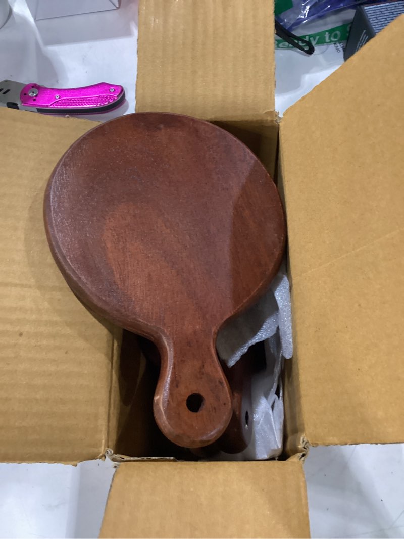 Condition photo showing Good Condition for the fine living co. set of 4 small appetizer serving plate, walnut charcuterie boards, acacia small round board, wood tray, mini serving board for cheese, meat, pizza, food-grade, 7"x5", 0.6" thick