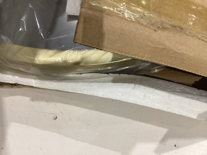 Condition photo showing As Is for wall mounted mirror 