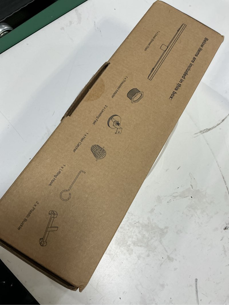 Condition photo showing Good Condition for 12-inch linear shower drain with tile insert grate, sus 304 stainless steel linear drain, brushed nickel long rectangle shower floor drain with leveling feet, hair strainer, fits bathroom brushed nickel 12 inch