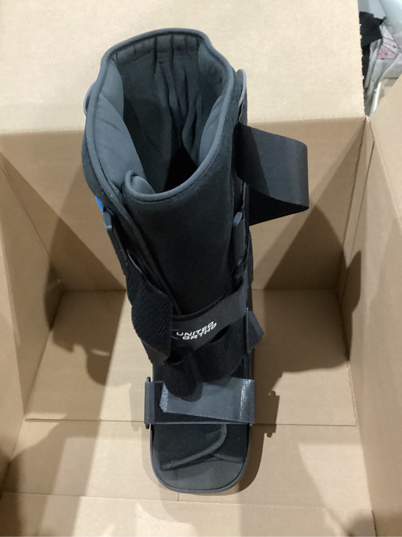 Condition photo showing Good Condition for united ortho cam walker fracture boot, medium, black black medium