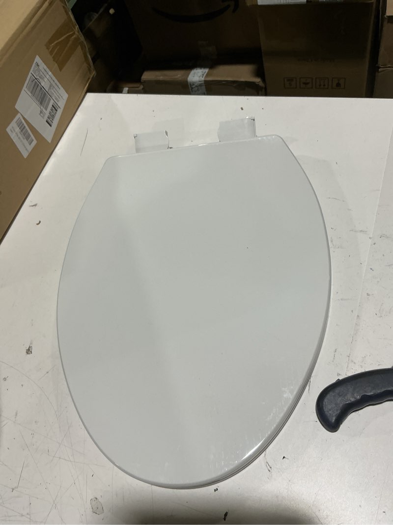 Condition photo showing As Is for 1m family toilet seat, patented slow close & quick releasing technology, anti-wiggling, easy to install and clean, standard elongated with toddler seat built in (1 piece) 1 elongated with toddler seat built in