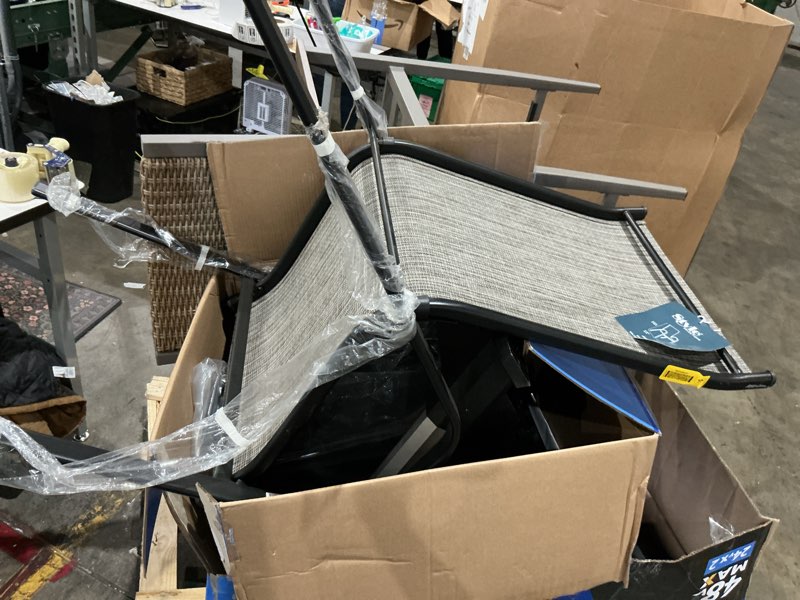 Condition photo showing As Is for style selections pelham bay woven stackable black metal frame stationary dining chair with tan sling seat