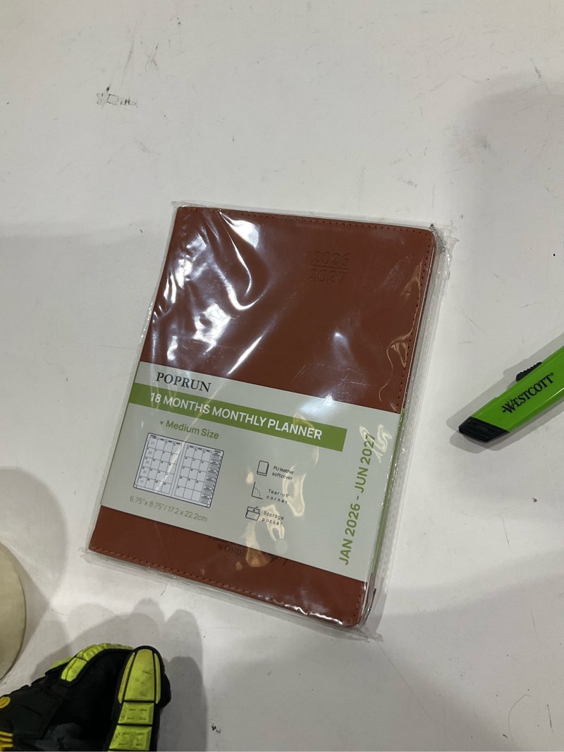 Condition photo showing New/Like New for POPRUN Monthly Planner 2026-2027 (Medium- 6.5'' x 8.5'' Soft Cover), 18-Month Calendar Book (Jan.2026 - Jun. 2027), Calendar Planner with Monthly Tabs & Pocket, 100 GSM Paper - Brown Brown Medium - 6.5'' x 8.5'' Jan. 2026 - Jun. 2027
