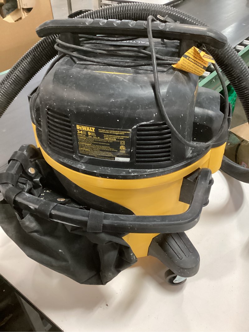 Condition photo showing As Is for DEWALT Stealthsonic Quiet 9-Gallon 5-HP Corded Wet/Dry Shop Vacuum