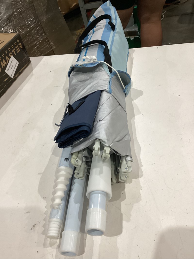 Condition photo showing Good Condition for outdoormaster beach umbrella for sand with sandbag & anchor