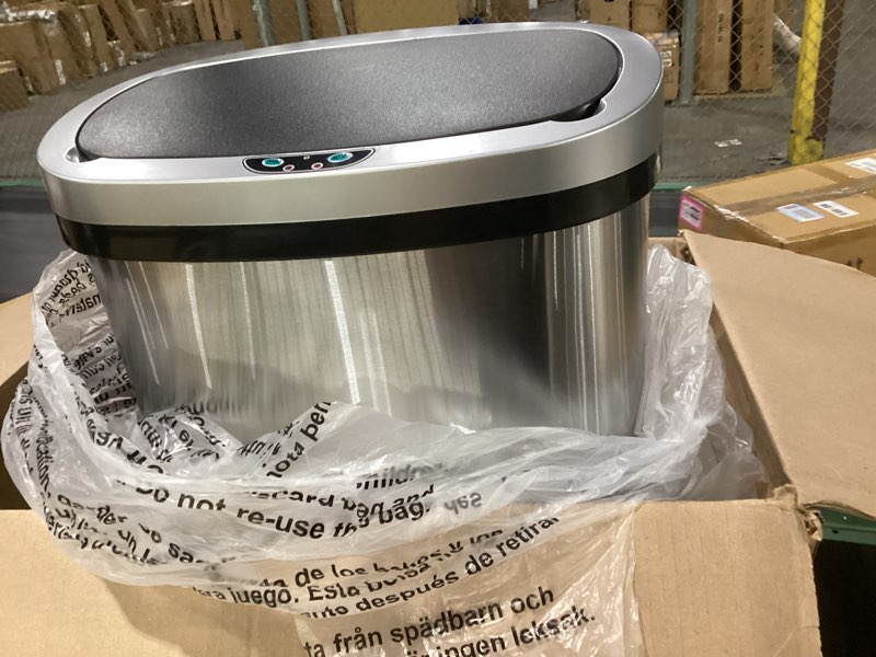 Condition photo showing Good Condition for Not tested!!! iTouchless 13 Gallon Oval Sensor Trash Can with Odor Filter, Automatic Motion Sensor Kitchen Bin, Soft-Close Stainless Steel, Slim Curved Wastebasket for Narrow Walkways & Islands, Matte Silver Light Silver, Black