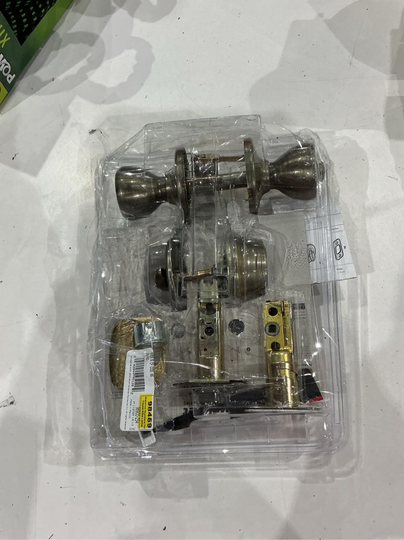Condition photo showing As Is for kwikset tylo antique brass exterior single-cylinder deadbolt and keyed entry door knob combo pack
