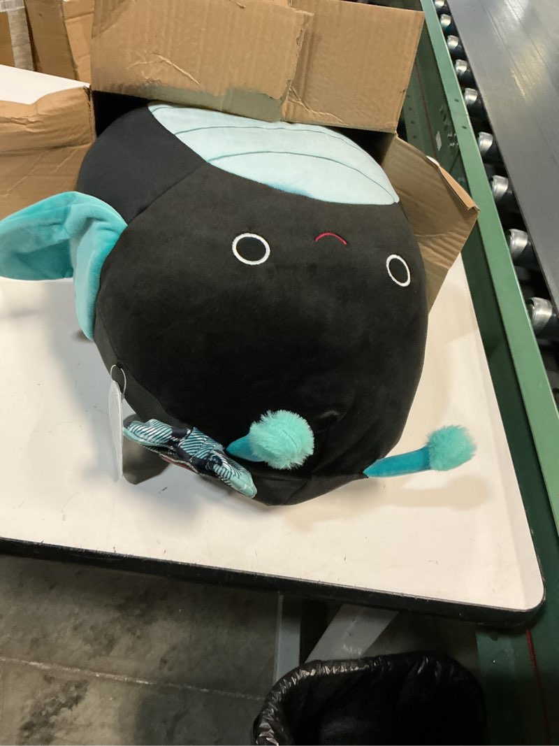 Condition photo showing Good Condition for Squishmallows Original 14in Celie The Teal and Black Grasshopper with Bow – Official Jazwares Plush 