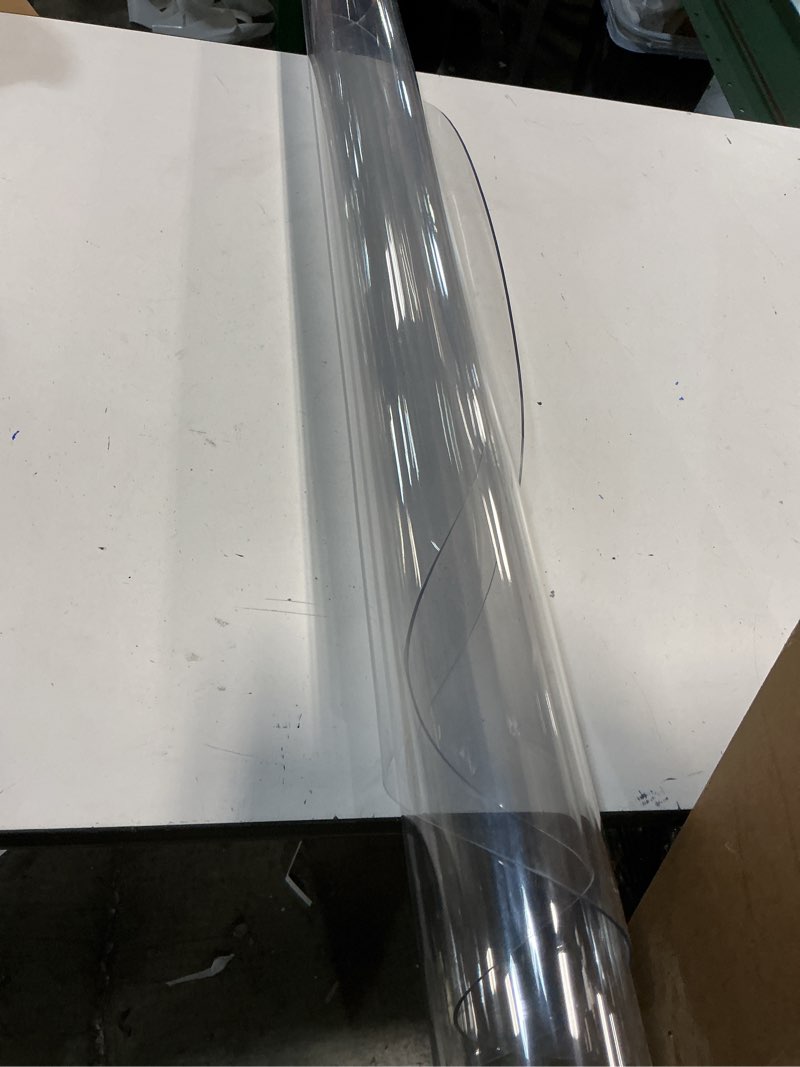 Condition photo showing Good Condition for Round clear table cover (unknown size)(similar to stock photo)