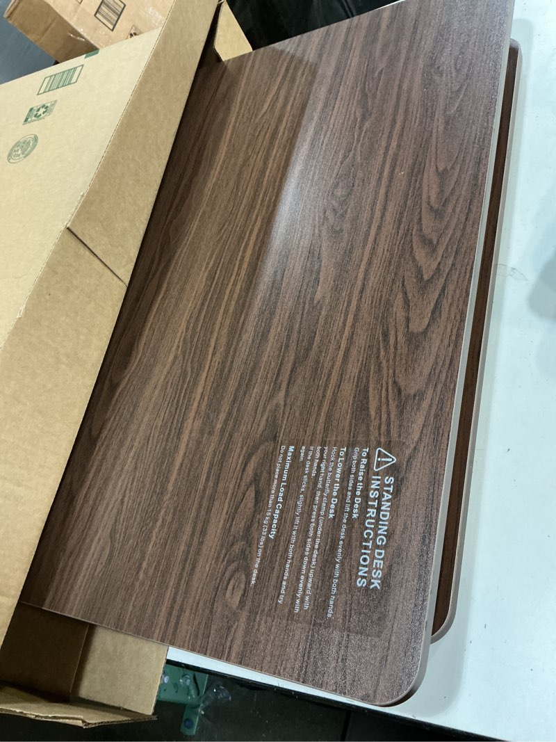Condition photo showing Good Condition for standing desk converter adjustable height, 25.16" × 15.75" height adjustable desktop riser, no assembly required, desktop workstation for laptop, monitor and office use (natural wood) (natural)