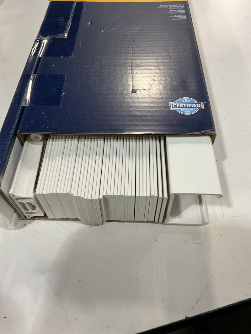 Condition photo showing As Is for levolor trim+go 2-in slat width 27-in x 64-in cordless white faux wood room darkening full-view standard horizontal blinds