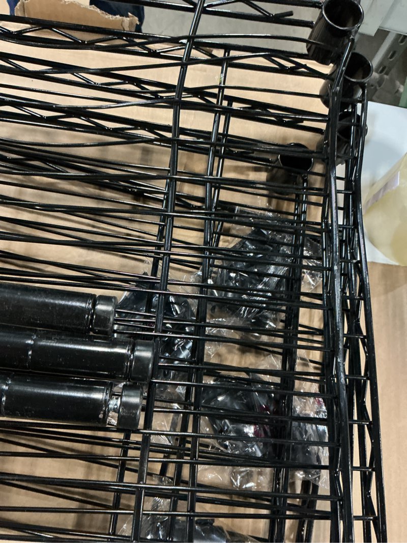 Condition photo showing As Is for style selections 47.7-in w x 18-in d x 72-in h 5 -tier black metal wire utility shelving unit