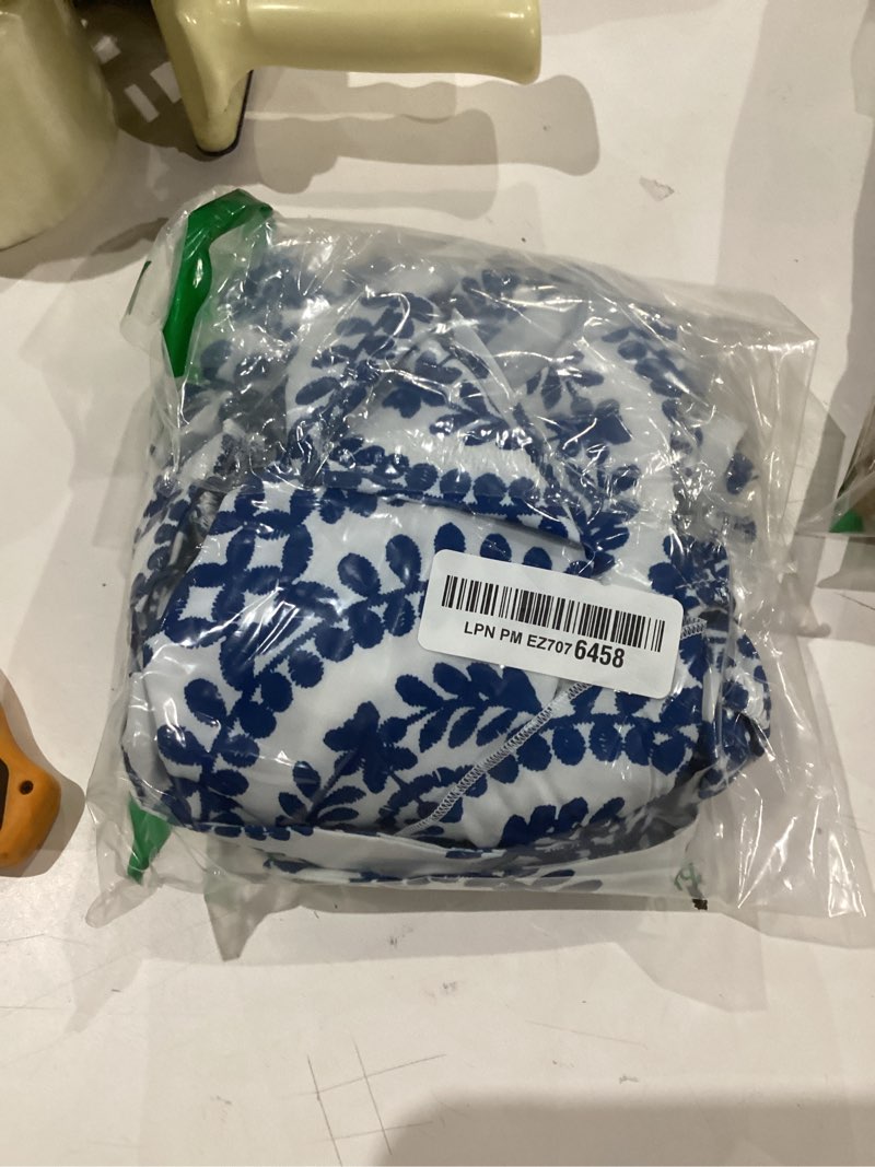Condition photo showing Good Condition for Milumia Women's Floral Print Ruffle Trim Sleeveless Romper Bow Backless Wide Leg Shorts Jumpsuit Small Blue