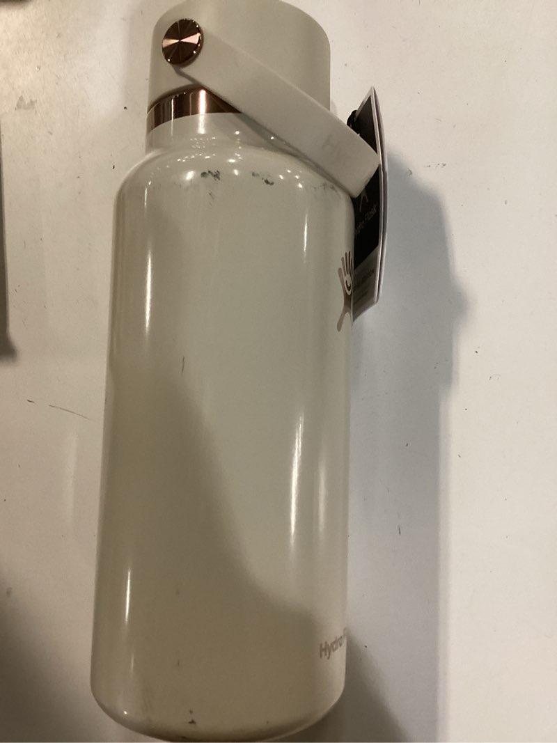 Condition photo showing As Is for hydro flask water bottle - insulated stainless steel - wide mouth flex straw lid, non spill, leakproof and refillable in 32 oz coconut cream