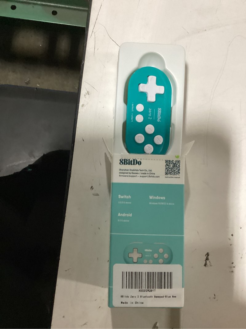 Condition photo showing New/Like New for nargos 8bitdo zero 2 bluetooth key chain sized mini controller for nintendo switch, windows, android and macos (turquoise edition)
