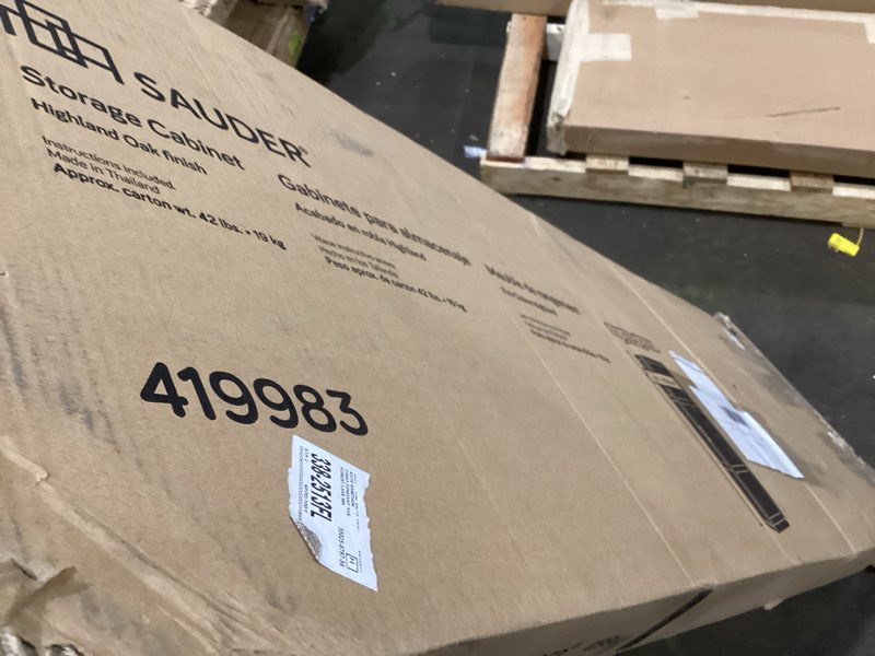 Condition photo showing As Is for sauder miscellaneous storage cabinet/ pantry cabinets, highland oak finish