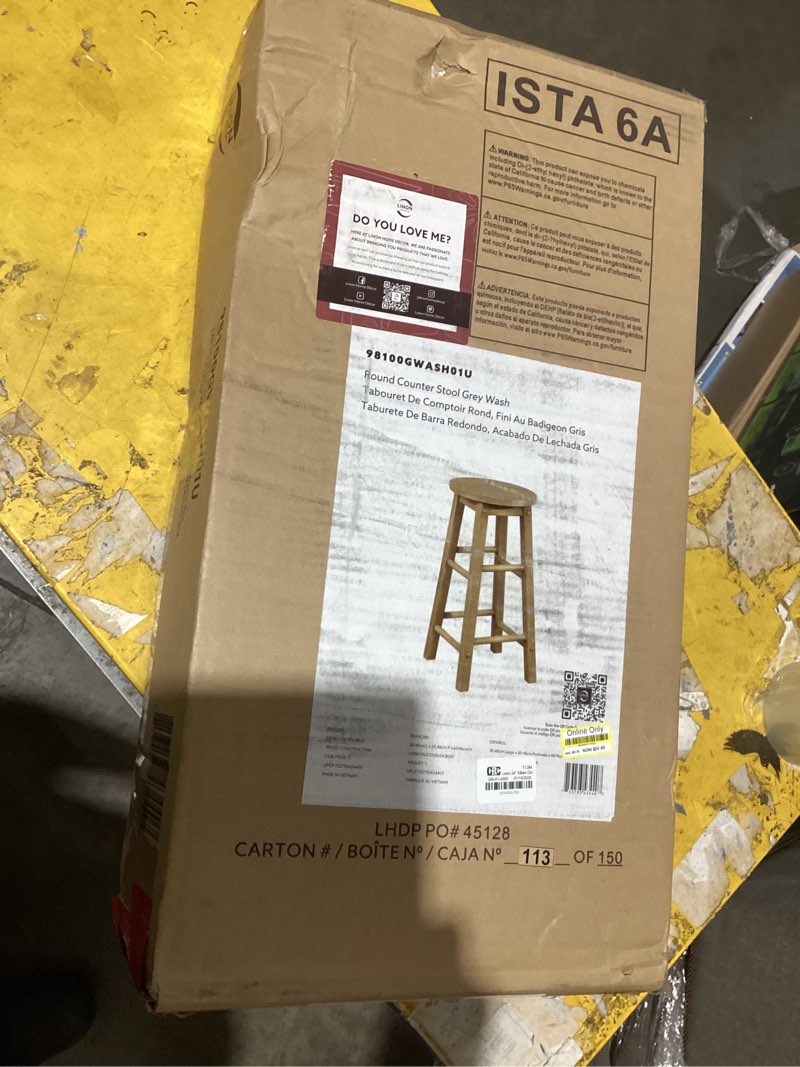 Condition photo showing As Is for bowery hill wood round counter stool, 24 in seat height, rubberwood, washed gray finish, rustic farmhouse style, durable kitchen, dining, or home pub seating, comfortable foot rails, easy assembly