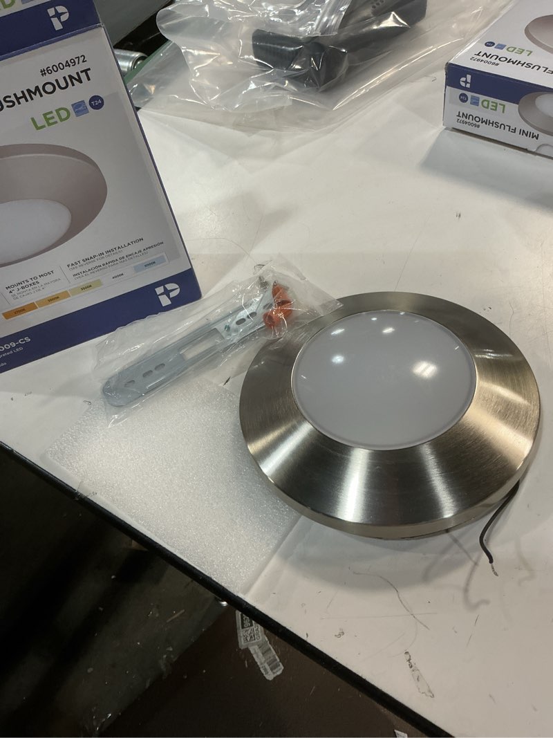 Condition photo showing As Is for Progress Lighting 7.5-in Brushed Nickel Outdoor 1 -Light LED Flush Mount Light Acrylic Shade