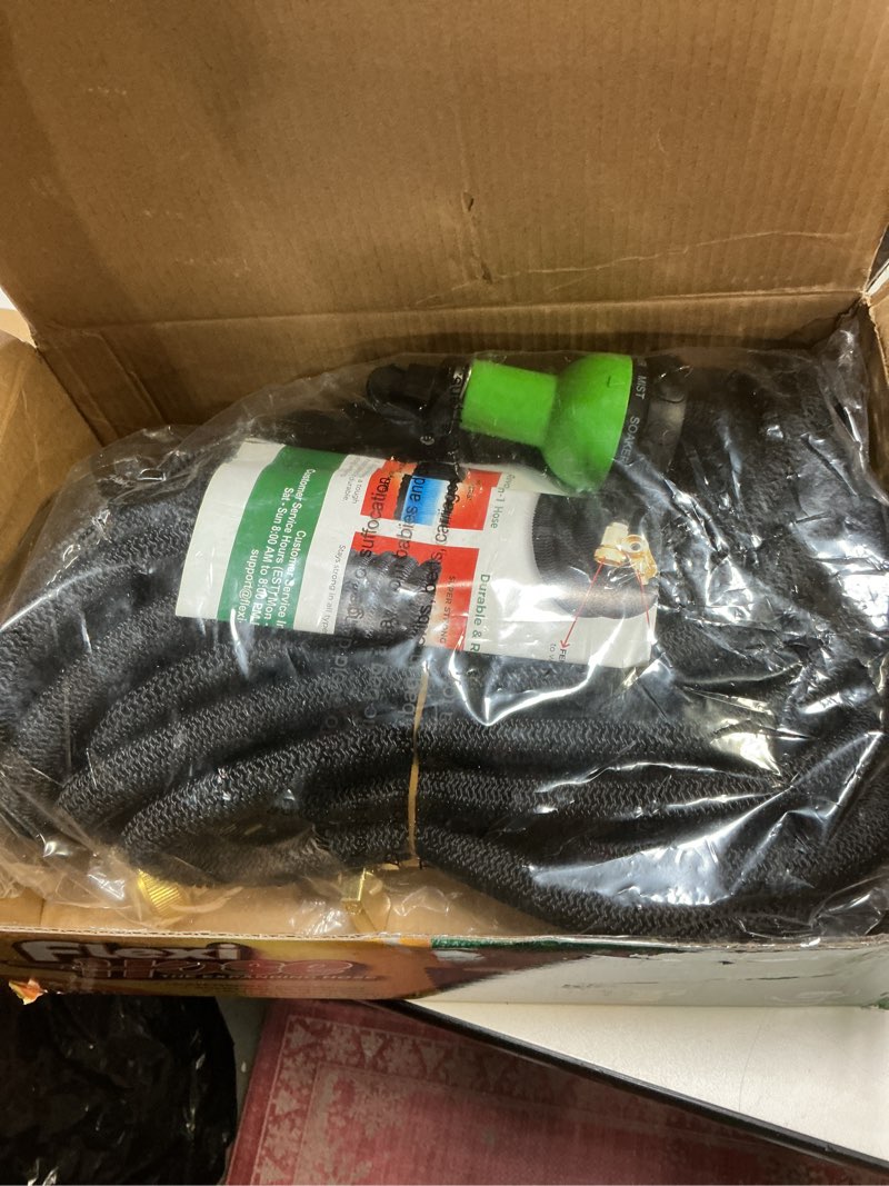 Condition photo showing Good Condition for Flexi Hose Expandable Garden Hose with 8 Function Nozzle, 100FT - Lightweight Retractable Garden Hose, Water Hose - No-Kink Flexibility, 3/4 Inch Solid Brass Fittings and Double Latex Core 100ft Black