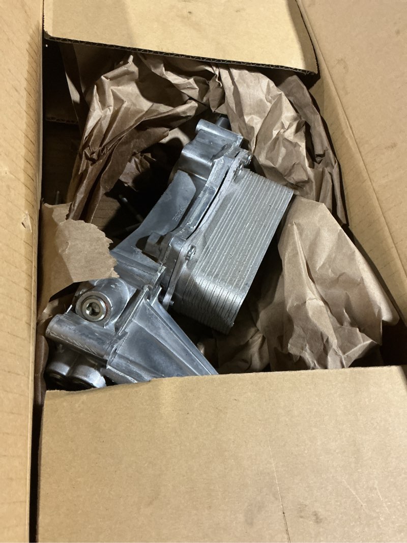 Condition photo showing As Is for Dorman 926-959 Patented Upgraded Aluminum Engine Oil Filter Housing with Oil Cooler and Filter Compatible with Select Models (OE FIX)