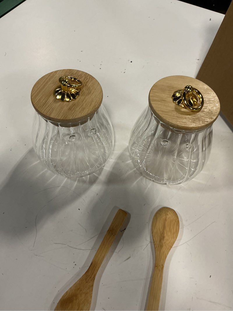 Condition photo showing As Is for 2 pack sugar container with bamboo lid and spoon,15oz sugar bowl glass jar (glass loops that hold spoons are broke off)