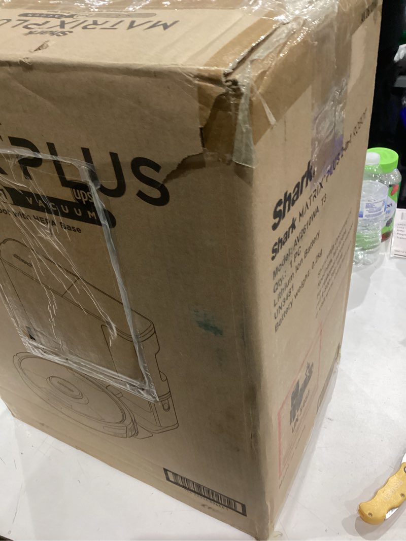 Condition photo showing As Is for Shark Robot Vacuum & Mop Combo, Powerful Suction, Matrix Plus, 60-Day Debris Capacity, HEPA Bagless Self Empty Base, Sonic Mopping, Home Mapping for Pet Hair - Carpets & Hardfloor, AV2610WA Wet and Dry Self-Empty (Gold/Black)