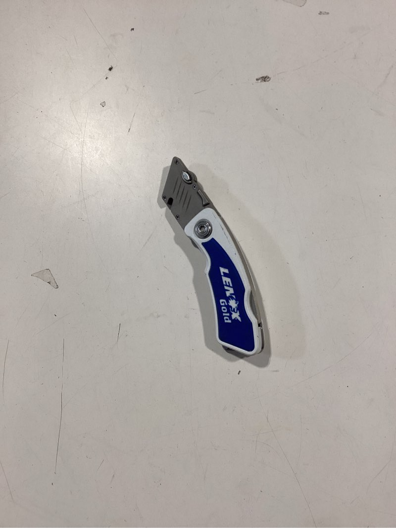 Condition photo showing As Is for lenox white 3/4-in 1 -blade folding utility knife incomplete
